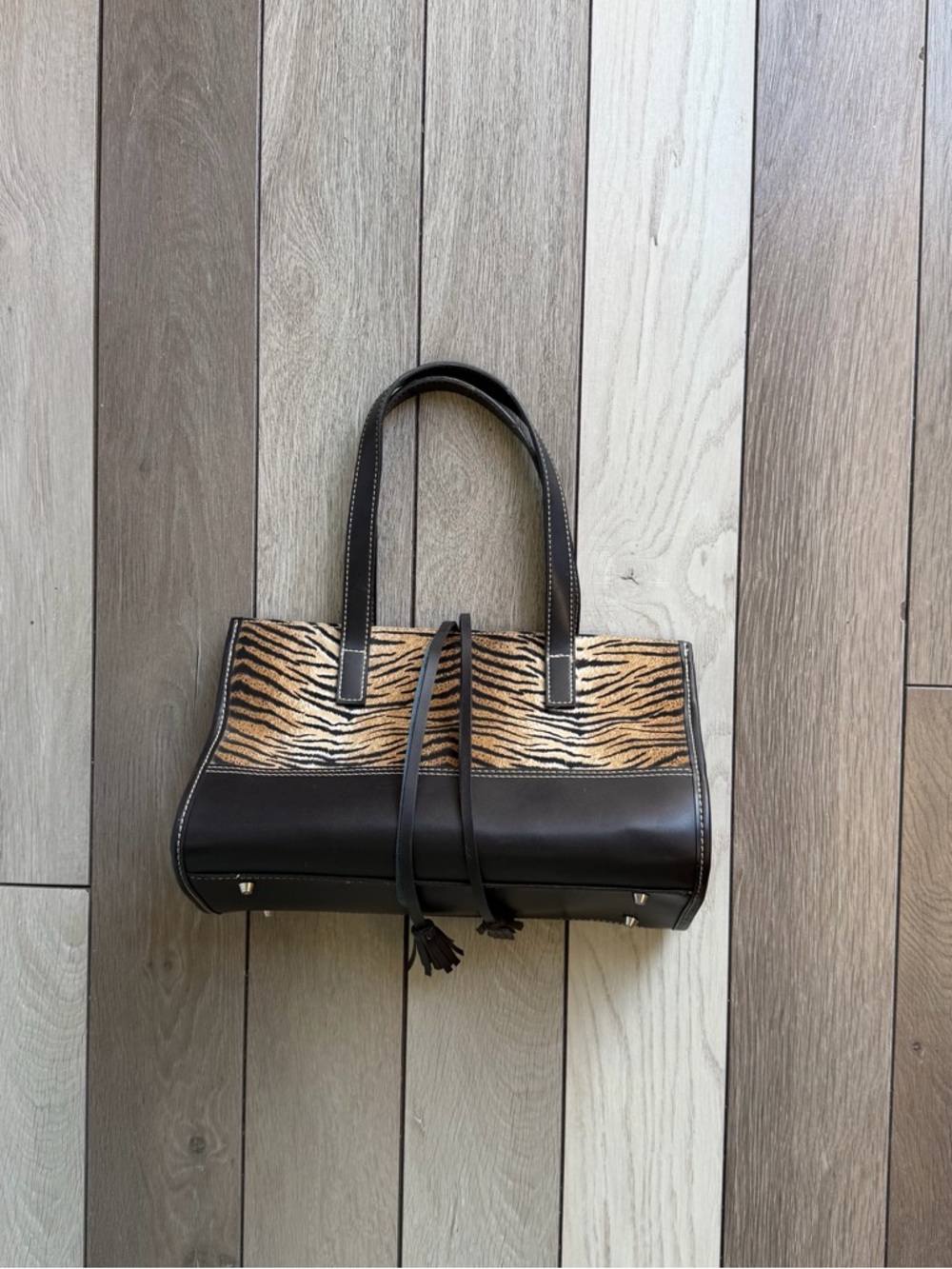 Maxx New York Y2K handbag features a distinct animal-print pattern